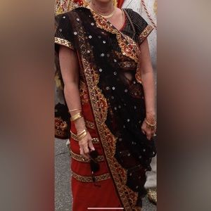 Beautiful black and red saree.